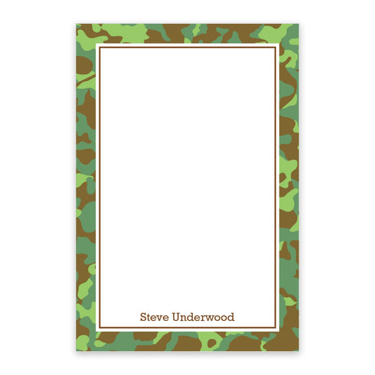 The Noteworthy Green Camouflage Personalized Notepad features a rectangular design with a brown camo border, white center, and "Steve Underwood" printed at the bottom.