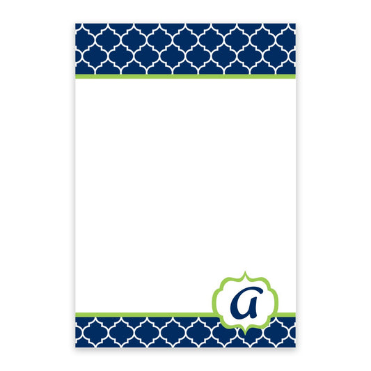 The Noteworthy Navy Lattice Pattern Personalized Notepad features geometric navy borders, green accents, and a stylized lowercase "a" in a green outline at the bottom right corner.