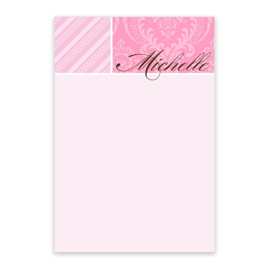 The Noteworthy Pink Damask Personalized Notepad features a patterned header with "Michelle" in cursive and a spacious blank area for notes; includes 100 sheets.