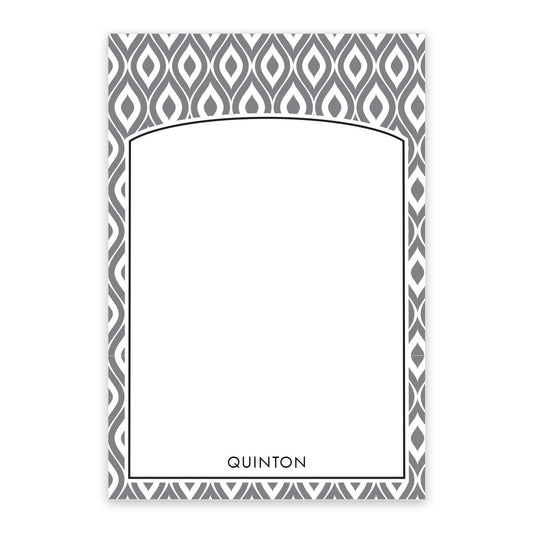 The Noteworthy Gray Abstract Pattern Personalized Notepad features a rectangular design with a gray and white abstract border, blank center, and the name "QUINTON" printed at the bottom.
