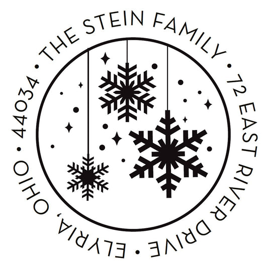 Featuring a black snowflakes design inside a circle with "The Stein Family, 12 East River Drive, Elyria, Ohio, 44034" around it, the Noteworthy Christmas Snowflakes Stamper or Embosser is perfect for custom address stamps.