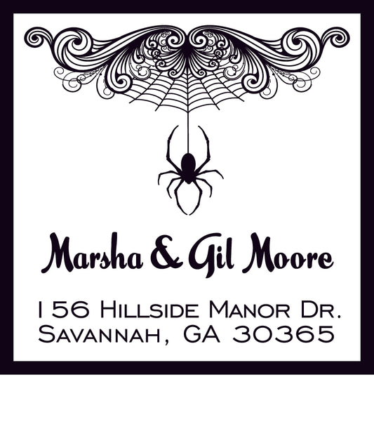 A black spider dangles from its web—made with the Noteworthy Spider Square Halloween Stamper or Embosser—above "Marsha & Gil Moore" and their Savannah, GA address on this decorative label.