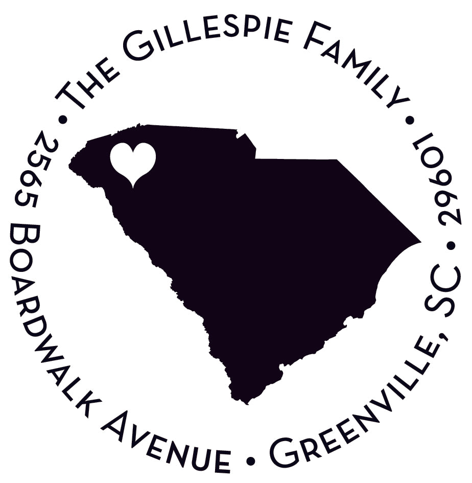 The Noteworthy Greenville, South Carolina Stamper or Embosser features a circular logo: “The Gillespie Family, 2565 Boardwalk Avenue, Greenville SC 29601” encircles an outline of South Carolina with a heart in the upper left.