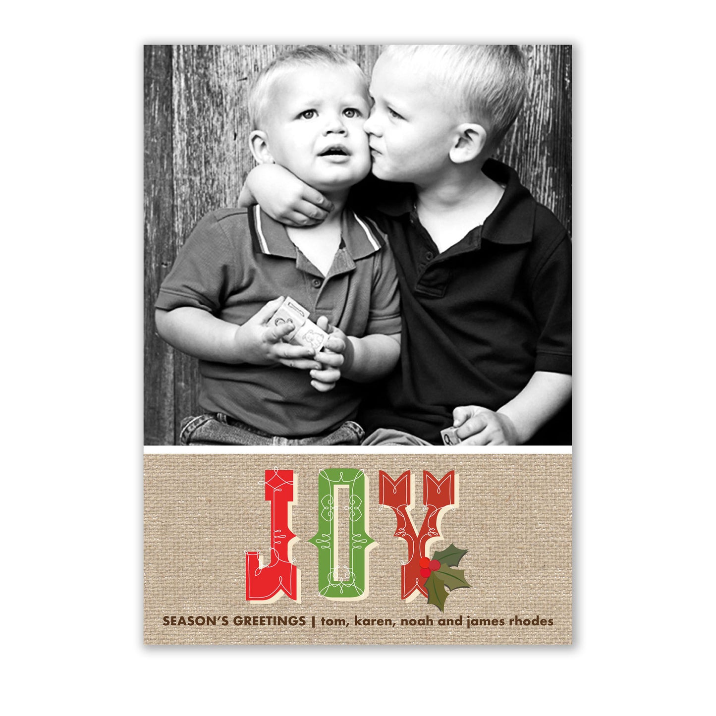 Two boys joyfully kissing on a Rustic Joy Photo Card by Noteworthy with white unlined envelopes.
