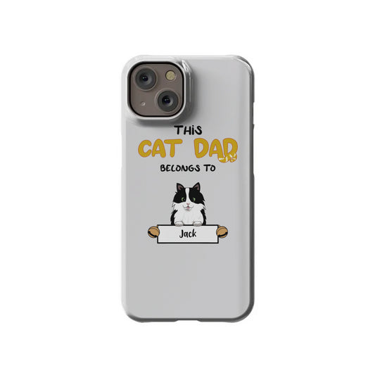 The InvitationBox.com Custom Cat Dad iPhone 14 Slim Case features a cute cat caricature, "This Cat Dad Belongs To" text, and the name "Jack" on a scroll beneath the cartoon cat.